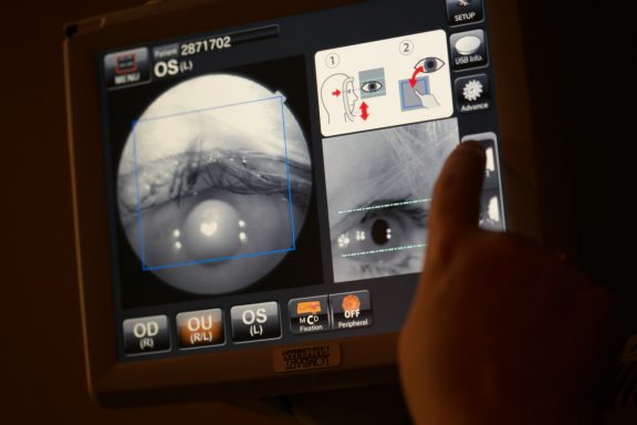 Picture of eye being taken by camera in clinic