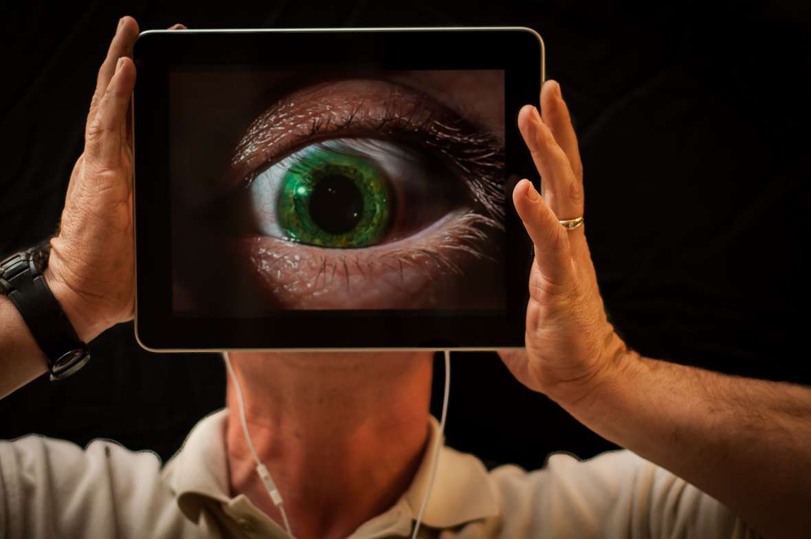 eye being magnified by an iPad